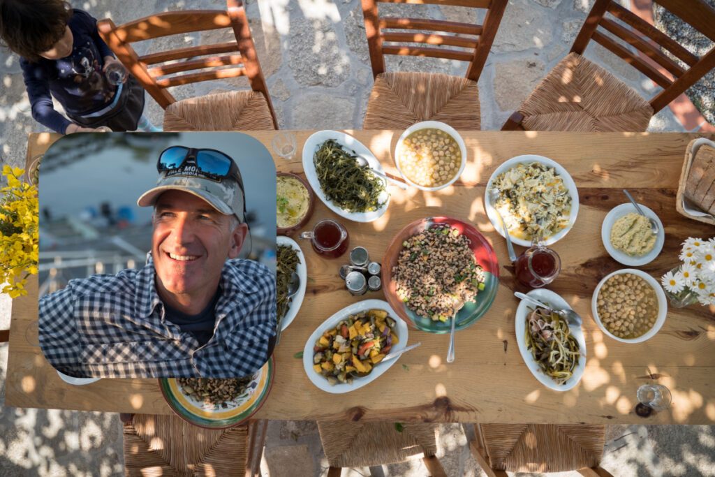man with table of food